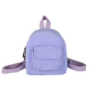 Minimalist light purple corduroy mini backpack with front flap pocket on white background