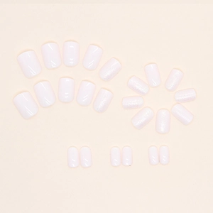 Short square soft pink and pearl white press-on nails with fine aurora glitter finish