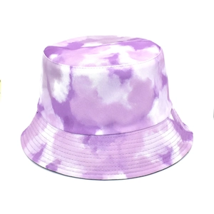 Detail of purple and white tie-dye bucket hat showing reinforced stitching on the brim