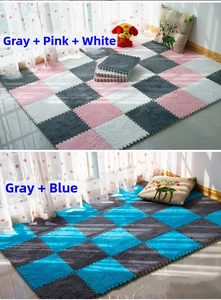 Detail of plush foam puzzle mats in gray, pink, white and blue color combinations