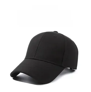Detail of black baseball cap featuring brown ELEVEN embroidery and premium cotton texture