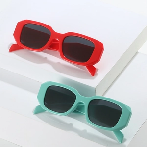 Modern square thick frame sunglasses with geometric edges in red and mint green