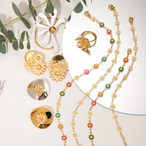 18k gold stainless steel daisy necklace and earring set with white enamel accents