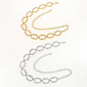 Golden and silver metal body waist chains featuring large textured oval geometric links