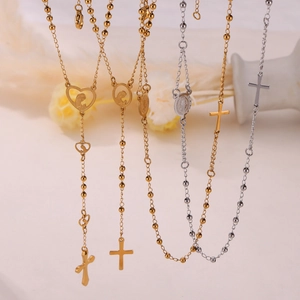 Religious style rosary necklace set in gold and silver finish with cross and heart charms