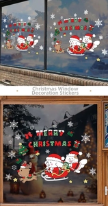 Detail of cartoon reindeer and Merry Christmas static stickers on a festive window display