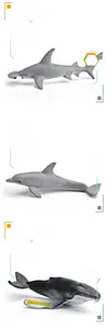 Detail view of realistic hammerhead shark, dolphin, and whale educational sea life models
