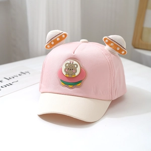 Detail of pink toddler baseball cap with 3D UFO ear decorations and cute bear patch
