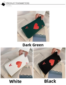 Detailed view of Ace of Hearts canvas wallets in green, white, and black with gold zippers