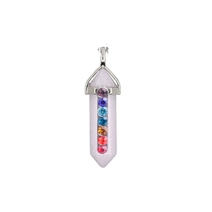 Detail of a hexagonal rose quartz chakra pendant with seven colorful faceted crystals