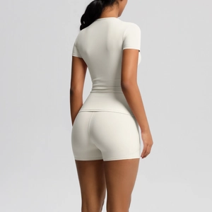Back view of breathable white yoga set with high elasticity short sleeves and slim shorts