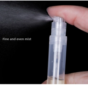 Macro shot of 5ml plastic perfume spray bottle showing fine and even atomization mist