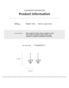 Detailed view of silver drop tassel earrings with leaf design and cubic zirconia