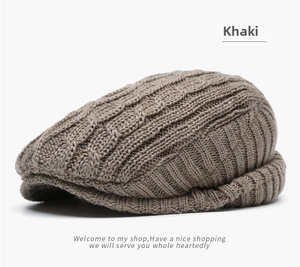 Detailed macro view of khaki knit ivy cap with classic cable-knit texture and soft wool blend