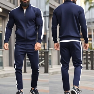 Navy blue men's tracksuit featuring high collar zip jacket and side stripe details