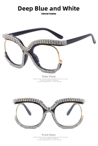Detail of dark blue and gold eyeglass frames with sparkling rhinestones and clear lenses