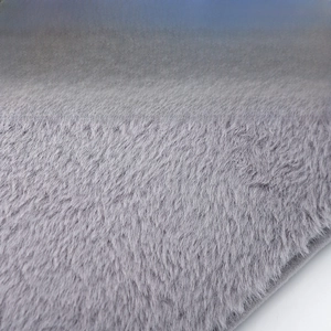Macro detail of soft grey crystal velvet fabric for electric heated waist belt