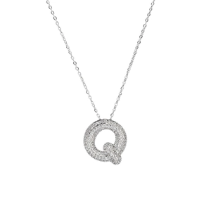 Close-up of silver necklace pendant featuring a bubbly letter Q with shiny cubic zirconia