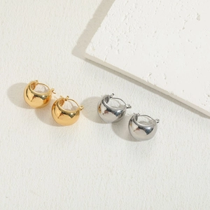 Polished gold and silver stainless steel hoop earrings in minimalist geometric curved design