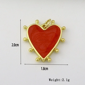 Detail view of red heart charm with gold trim showing 2.0cm height and 1.8cm width dimensions