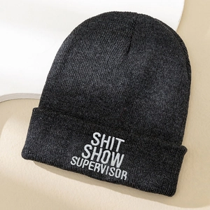 Dark grey knitted beanie with white SHIT SHOW SUPERVISOR embroidery text for winter wear