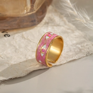 Pink enamel evil eye wide band ring in gold finish with adjustable open design
