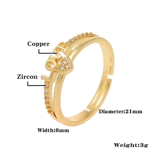 Detail of gold LOVE ring with zircon, material copper, 21mm diameter and 6mm width