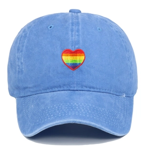 Light blue washed cotton baseball cap with colorful rainbow heart embroidery design