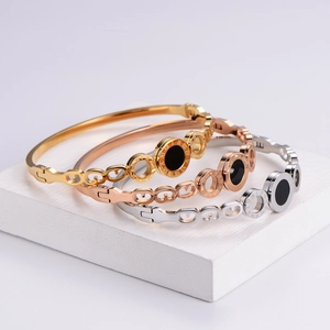 Three-piece rose gold and silver titanium steel bracelets with Roman numerals engraving