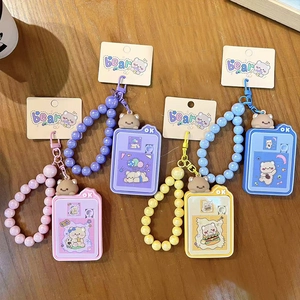 Creative bear sliding puzzle keychains with colorful beaded wristlets for bag accessories.