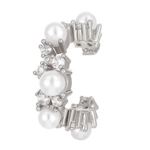 Detail of vintage silver C-shaped ear cuff with white pearls and sparkling zircons