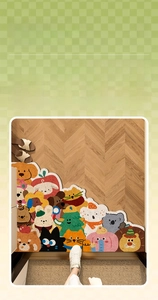 Detail of Toba Family colorful cartoon animal PVC floor mat on a wooden floor