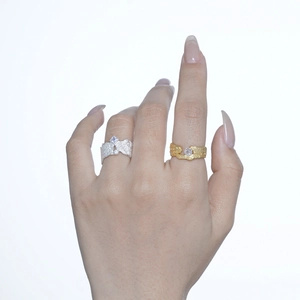 Textured S925 sterling silver rings with lava finish and sparkling center crystals