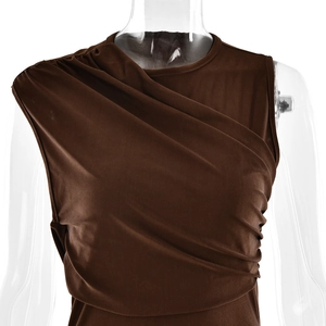 Detail of brown sleeveless dress featuring elastic fabric with asymmetrical drapes and folds