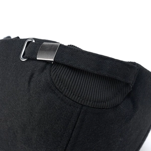 Detail of adjustable metal buckle and black twill fabric on back of men's winter cap