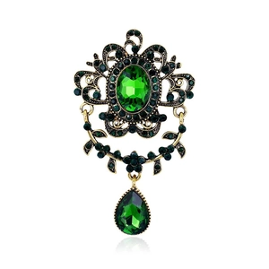 Luxurious vintage green crystal brooch with floral bronze metal and pear-shaped drop