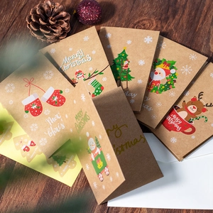 Detailed view of vintage kraft Christmas cards with reindeer and snowman designs