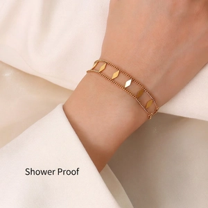 Double-layer 18K gold-plated titanium steel bracelet with polished geometric diamond charms