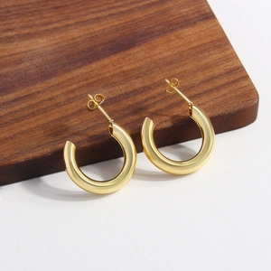 Minimalist C-shaped hollow tube hoop earrings in 18k gold plated stainless steel