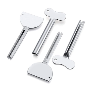 Zinc alloy toothpaste squeezer set with silver finish in semi-circle and butterfly shapes