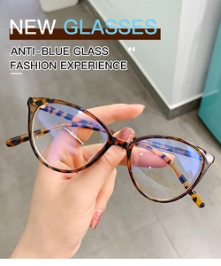 Detailed close-up of cat-eye tortoiseshell glasses frame with CE certification mark