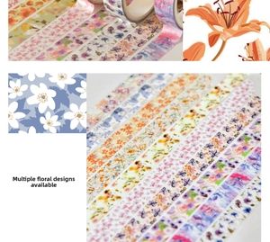 Macro detail of floral washi tape set featuring translucent watercolor flower patterns