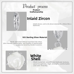 Detail of 925 sterling silver white rose charm with 3A cubic zirconia and mother of pearl