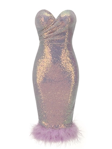 Detailed view of luxury purple sequin tube dress with ostrich feather hemline