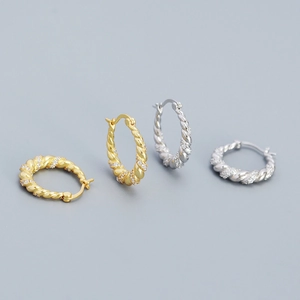 Twisted rope texture hoop earrings with micro-set zircon stones in gold and silver finish