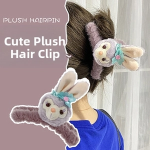 Detail of plush purple bunny hair claw clip showing soft texture and StellaLou style