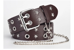 Detail of dark brown punk belt with silver star studs, metal eyelets and side chain
