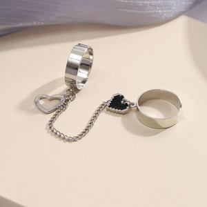 Silver punk double ring with heart pendants connected by a thin chain for women