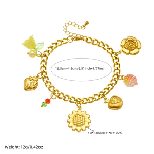 Bracelet doré avec breloques tournesol et détails précis sur la taille et le poids