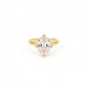 18k gold plated open ring featuring a marquise cut cubic zirconia stone on white background